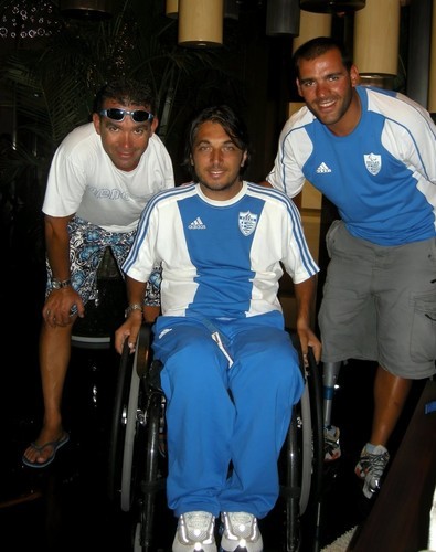 Greek Sonar team - Vasilios in wheelchair, Nikos on left and Theo on right.  © Event Media